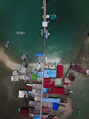 view of the pier with boats in Thailand on the island of Ko Chang 