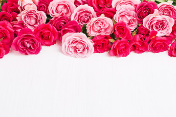 Pink roses bouquet on white background. Mothers day, Valentines Day, Birthday celebration concept. Greeting card. Copy space