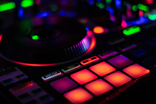 Colorful Performance MPC Pads on DJ Controller with jog wheel or turn table