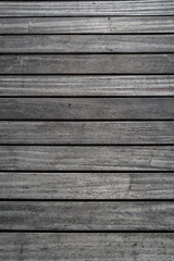 Obraz premium weathered wooden planks of seaside dock for background and texture
