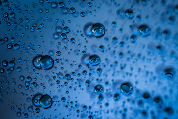 Water droplets on blue