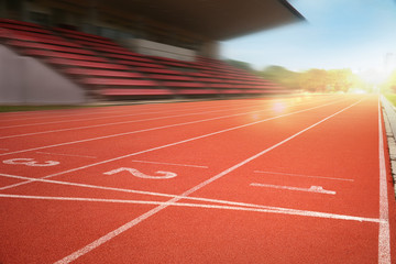 nobody running track for athletic competition, empty motion blur race background for training