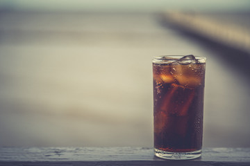 Cola with ice in the glass ready to drink for refresh