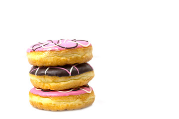 Colorful donuts stacked isolated on white