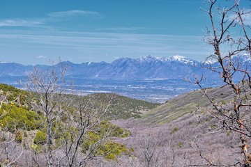 Views of Wasatch Front Rocky Mountains from the Oquirrh Mountains in early spring, Hiking in Yellow Fork trail and Rose Canyon in Great Salt Lake Valley. Utah, United States. USA.