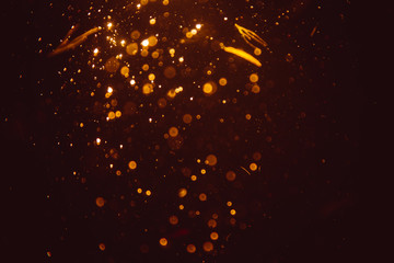 Abstract gold defocus bokeh glitter vintage lights with black