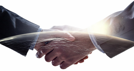 Partnership concept. Image of handshake