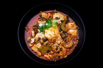 Korean spicy silken tofu stew which is called Sundubu Jjigae