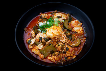 Korean spicy silken tofu stew which is called Sundubu Jjigae