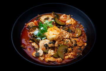 Korean spicy silken tofu stew which is called Sundubu Jjigae
