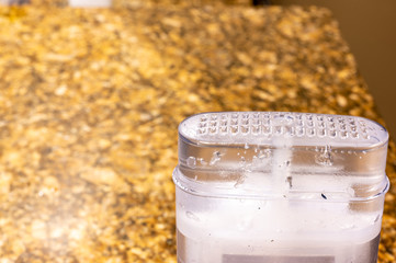 Subjective focus on top grid of clear gel deodorant 