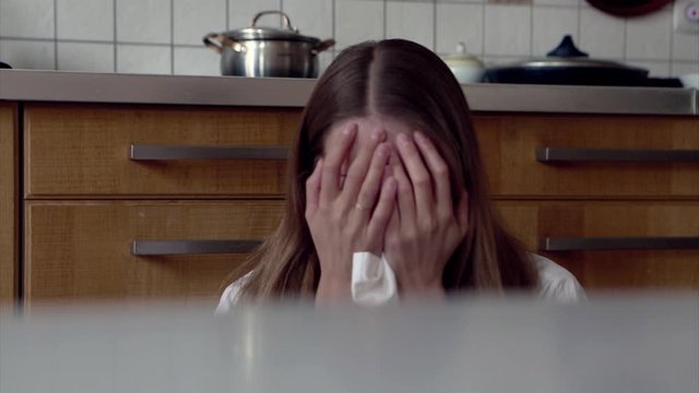 Portrait of a girl who covered her face with a mask. Frightened eyes of the patient. The woman screams. The concept of quarantine, self-isolation, protection from coronavirus, virus, fear of disease, 