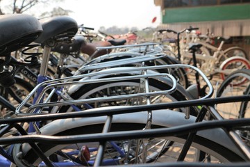 Fototapeta na wymiar bicycle parking in the park