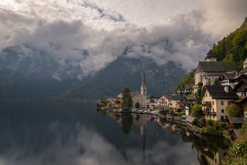 Lakeside reflections of the beautiful village of Hallstatt in Austria