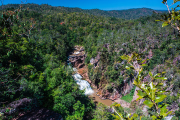 Fototapeta na wymiar Kaeng Chang waterfall, waterfall in Huang river border of Thailand and Laos. Loei province, Thailand.