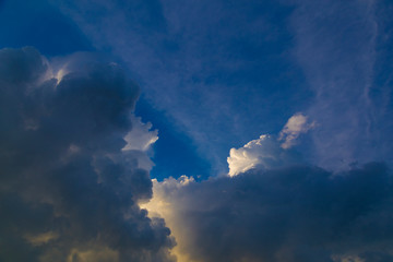 Big cumulus clouds in sunlight. Cloudscape