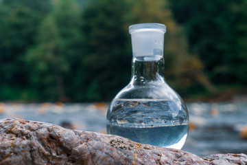 Glass flask with clean drinking water.