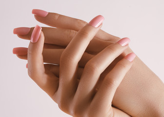 Beautiful Woman Hands. Soft skin, spa skincare concept. Female Hands Applying Cream or Lotion....