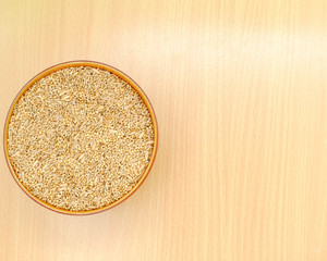 Budgies Bird food in red bowl