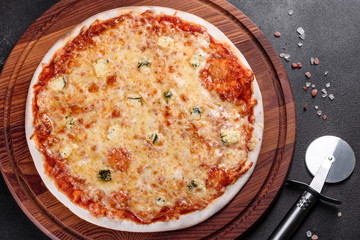 Delicious fresh oven cooked pizza four cheeses