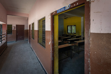 Empty corridor and classroom entry door of school in India - 344413435