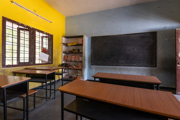Empty classroom with desks in Indian school - 344413469