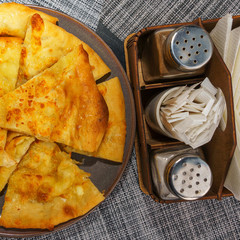 Georgian dish - Megrelian khachapuri. As a filling, young imeritin cheese is used. The salt and...