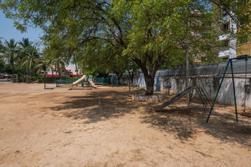 Empty playground at urban school in India - 344414069
