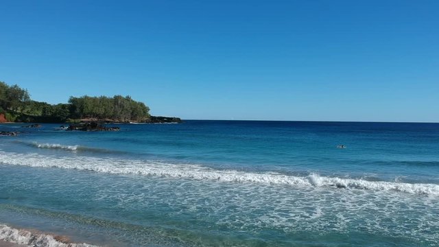 Rare glassy morning in Koki beach Maui