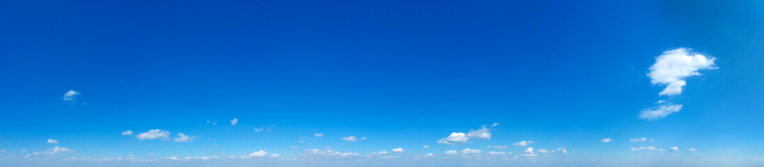 Blue Sky background with tiny Clouds. Panorama background