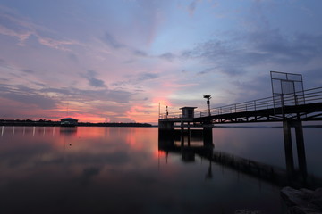 Fototapeta premium Dokkrai Reservoir and view sunset water reflection at rayong, thailand 
