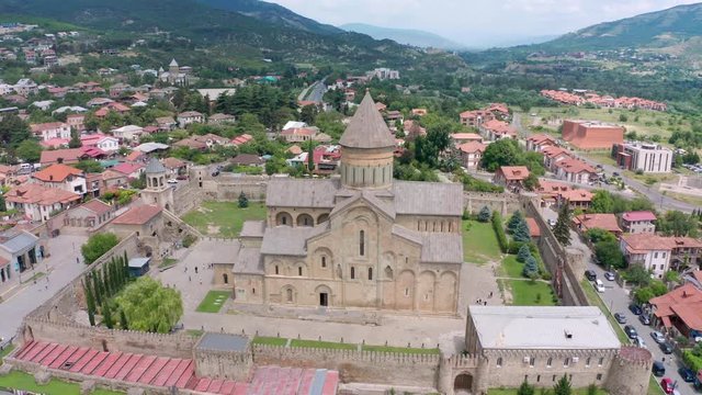 flight over of the Mtskheta, The Old Town Lies At The Confluence Of The Rivers Mtkvari And Aragvi. Svetitskhoveli Cathedral, Ancient Georgian Orthodox Church, Unesco Heritage In The Center.