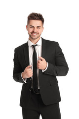 Portrait of handsome young businessman on white background