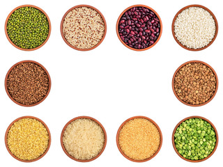 Square frame collection of various grains, legumes and brown sugar in bowls isolated on white background. Set of cereals. Top view, copy space