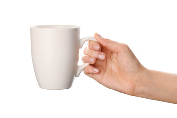 Female hand with blank cup on white background