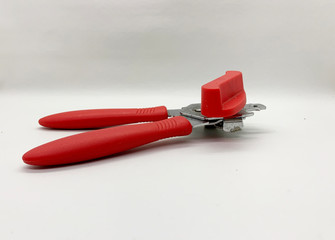 Red can opener isolated on white backgroound