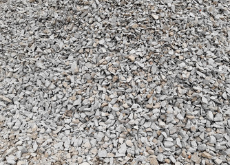 quarry production fraction stone gravel granite gray white pattern rubble field 