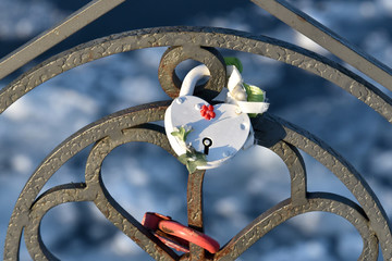 The locks for the newlyweds on the forged fence