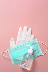 coronavirus concept,,Coronavirus prevention set, hand sanitizer gel, protective mask, gloves and thermometer