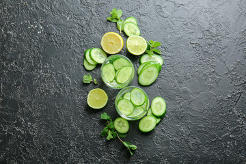 Glasses of cucumber infused water on table