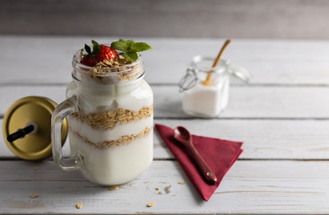 Vegetarian breakfast of yogurt with strawberry and muesli