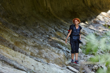 Woman hiking into the mountains