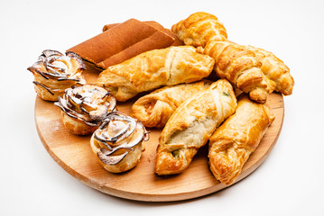 wooden tray with different bakery products