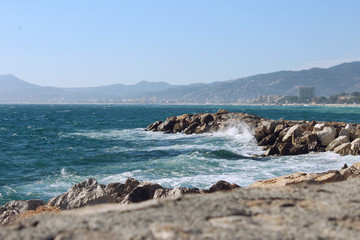 waves crashing on rocks