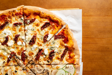 italian pizza on the wooden background