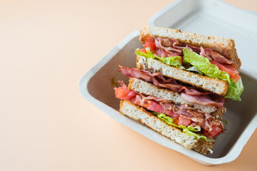 A BLT is a type of sandwich, named for the initials of its primary ingredients, bacon, lettuce and...