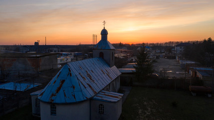 sunset over the church
