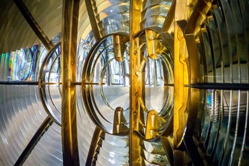Abstract detail of lighthouse double lens which looks like an owl displayed at museum at...