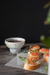 sandwich with red fish and arugula. Quick breakfast. Healthy Nutrition and Vitamins, Coffee and tea