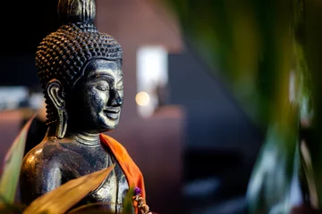 Zelfklevend Fotobehang buddha statue in interior garden at tropical bar in thailand © TravelPhotography